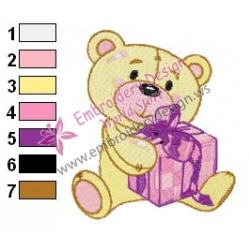 Teddy Bear Holding a Gift Embroidery Design